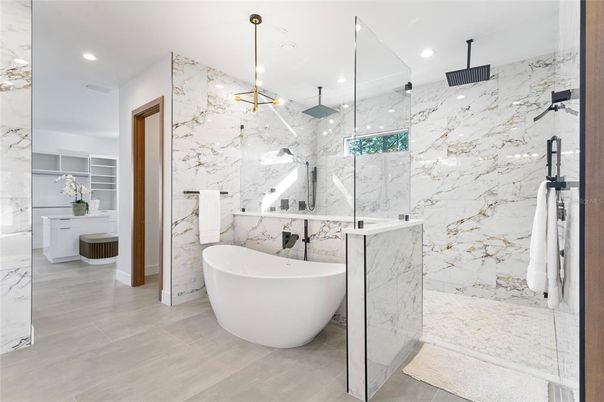 Bathroom, Free Standing Baths, Glass Shower, Interior, Marble, Marble Walls, Recessed Lighting