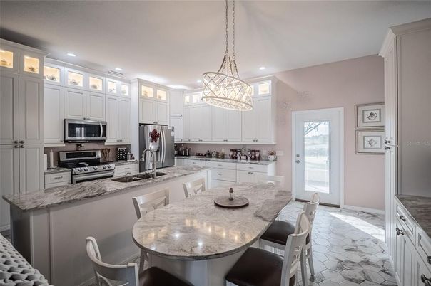 Dining room, Interior, Kitchen, Marble, Pendant Lights, Recessed Lighting, Stainless Steel Appliances