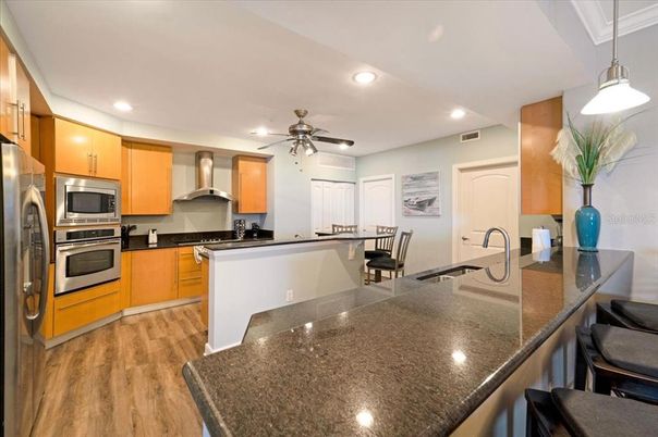 Interior, Kitchen, Pendant Lights, Recessed Lighting, Stainless Steel Appliances, Wood Texture Flooring