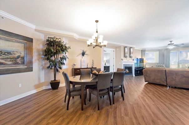 Chandelier, Dining room, Fireplace, Interior, Living room, Recessed Lighting, Wood Texture Flooring