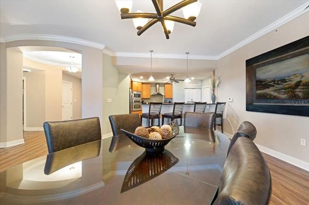 Dining room, Interior, Kitchen, Pendant Lights, Recessed Lighting, Stainless Steel Appliances, Wood Texture Flooring