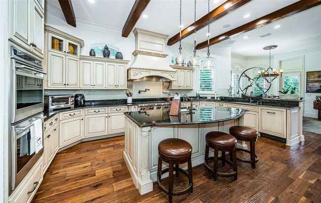 Chandelier, Interior, Kitchen, Pendant Lights, Recessed Lighting, Stainless Steel Appliances, Wooden Beams, Wood Texture Flooring