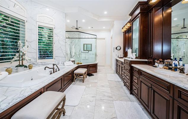 Bathroom, Dual Sink Vanities, Glass Shower, Interior, Marble, Marble Walls, Recessed Lighting