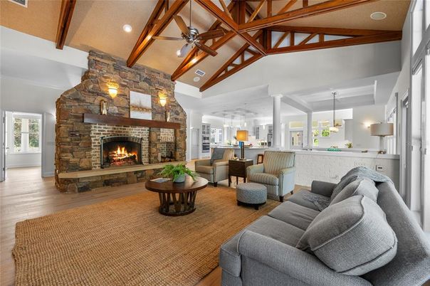 Fireplace, Interior, Living room, Pendant Lights, Recessed Lighting, Stone Walls, Wooden Beams, Wood Texture Flooring