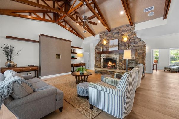 Fireplace, Interior, Living room, Recessed Lighting, Stone Walls, Wooden Beams, Wood Texture Flooring