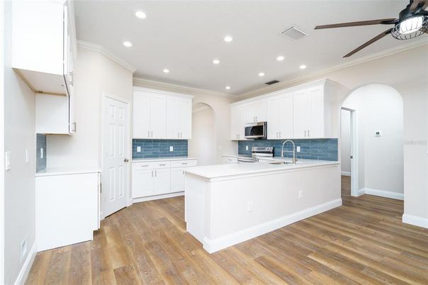 Interior, Kitchen, Recessed Lighting, Stainless Steel Appliances, Wood Texture Flooring