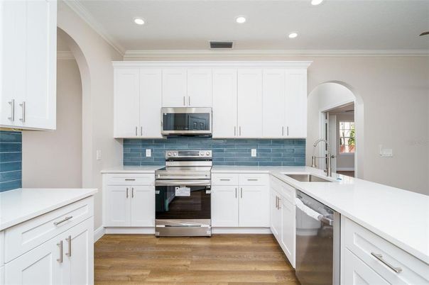Interior, Kitchen, Recessed Lighting, Stainless Steel Appliances, Wood Texture Flooring