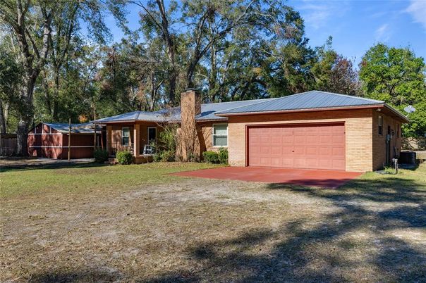 Attached, Backyard, Exterior, Facade, Brick Facade, Ranch