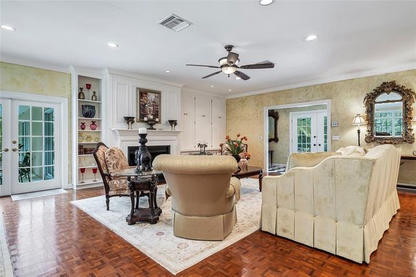 Dining room, Fireplace, Interior, Living room, Recessed Lighting, Wood Texture Flooring
