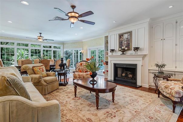Dining room, Fireplace, Interior, Living room, Recessed Lighting, Wood Texture Flooring