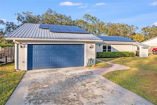 Attached, Exterior, Facade, Solar Panels, Ranch