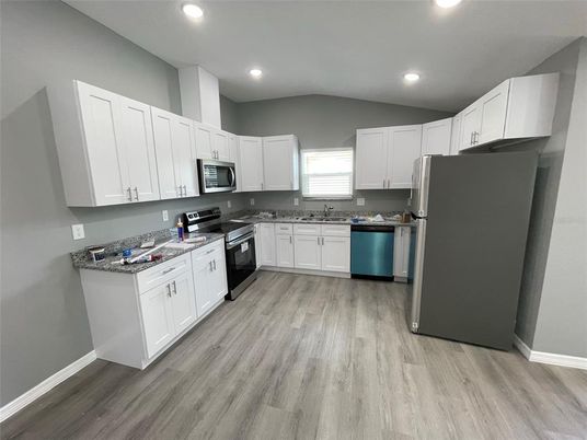 Interior, Kitchen, Recessed Lighting, Stainless Steel Appliances, Wood Texture Flooring