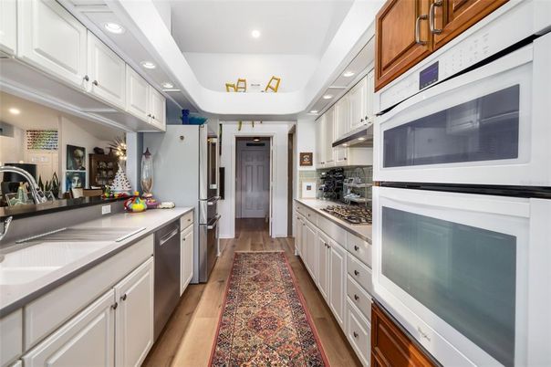 Interior, Kitchen, Recessed Lighting, Stainless Steel Appliances, Wood Texture Flooring