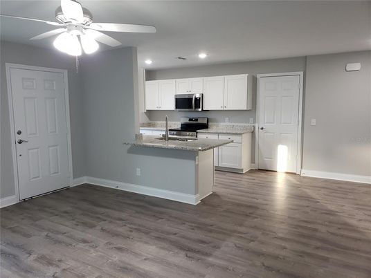 Interior, Kitchen, Recessed Lighting, Stainless Steel Appliances, Wood Texture Flooring