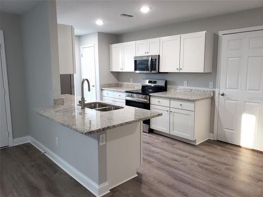 Interior, Kitchen, Recessed Lighting, Stainless Steel Appliances, Wood Texture Flooring