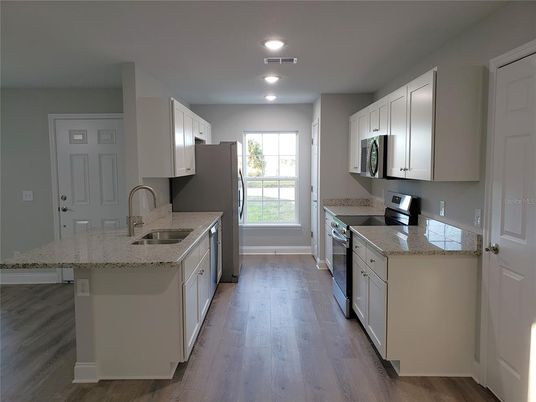 Interior, Kitchen, Recessed Lighting, Stainless Steel Appliances, Wood Texture Flooring