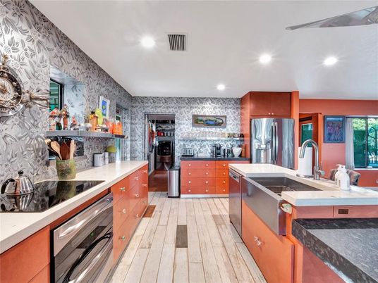 Interior, Kitchen, Recessed Lighting, Stainless Steel Appliances, Stone Walls, Wood Texture Flooring