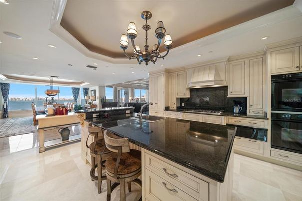 Chandelier, Dining room, Interior, Kitchen, Living room, Pendant Lights, Recessed Lighting, Stainless Steel Appliances, Water