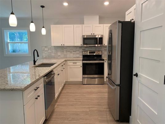 Interior, Kitchen, Pendant Lights, Recessed Lighting, Stainless Steel Appliances, Wood Texture Flooring