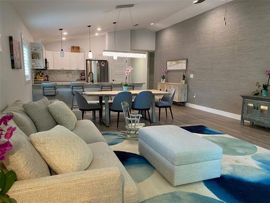 Dining room, Interior, Kitchen, Living room, Pendant Lights, Recessed Lighting, Stainless Steel Appliances, Wood Texture Flooring
