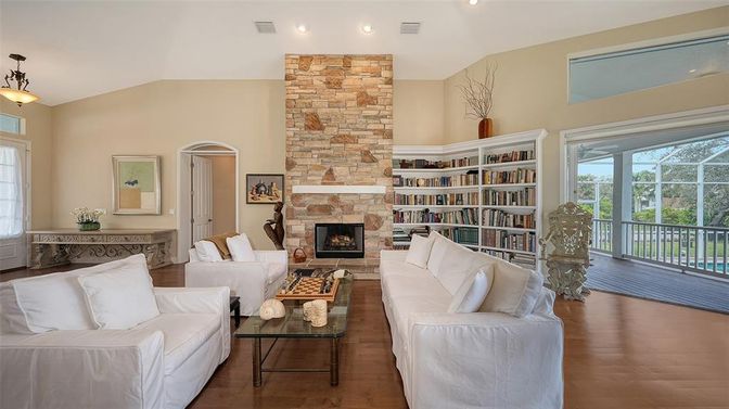 Fireplace, Interior, Living room, Pendant Lights, Recessed Lighting, Stone Walls, Wood Texture Flooring