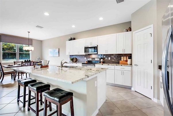 Chandelier, Dining room, Interior, Kitchen, Recessed Lighting, Stainless Steel Appliances