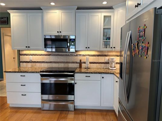 Interior, Kitchen, Recessed Lighting, Stainless Steel Appliances, Wood Texture Flooring