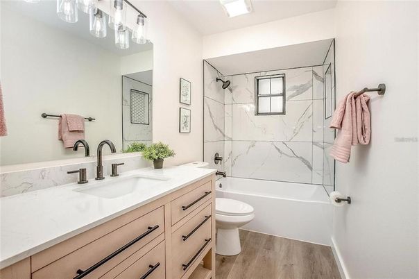 Bathroom, Dual Sink Vanities, Interior, Marble Walls, Wood Texture Flooring