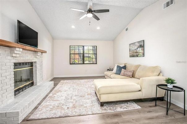 Fireplace, Interior, Living room, Recessed Lighting, Wood Texture Flooring