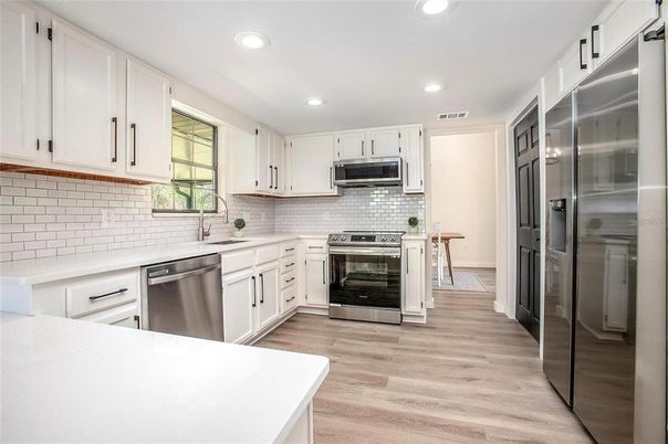 Interior, Kitchen, Recessed Lighting, Stainless Steel Appliances, Wood Texture Flooring