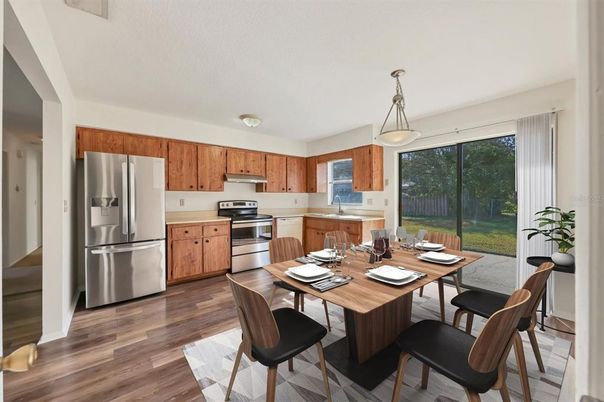 Dining room, Interior, Kitchen, Pendant Lights, Stainless Steel Appliances, Wood Texture Flooring