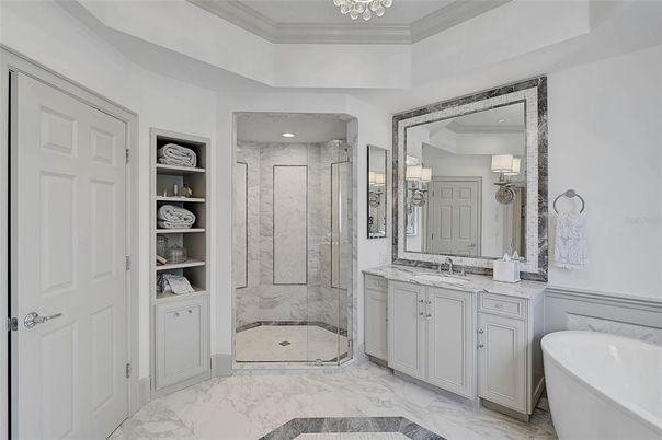 Bathroom, Dual Sink Vanities, Free Standing Baths, Glass Shower, Interior, Marble, Marble Walls, Recessed Lighting