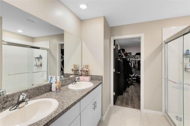 Bathroom, Dual Sink Vanities, Glass Shower, Interior, Recessed Lighting, Walk-in Closets