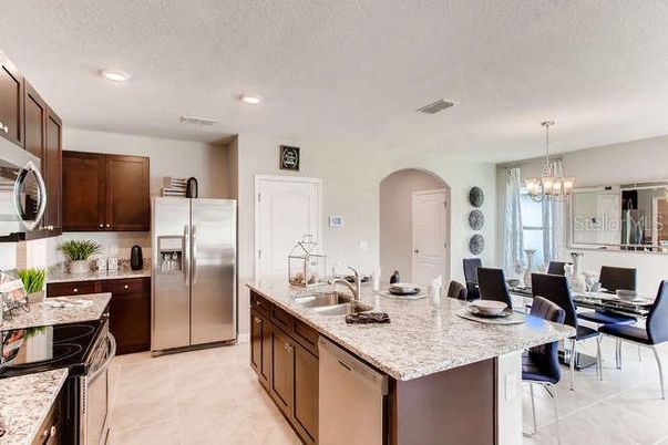 Chandelier, Dining room, Interior, Kitchen, Recessed Lighting, Stainless Steel Appliances