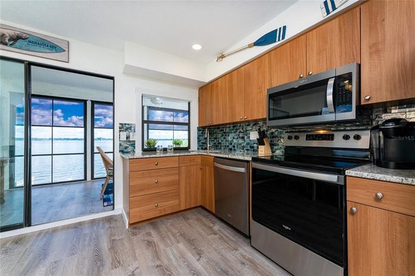 Interior, Kitchen, Recessed Lighting, Stainless Steel Appliances, Wood Texture Flooring