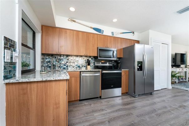 Interior, Kitchen, Recessed Lighting, Stainless Steel Appliances, Wood Texture Flooring