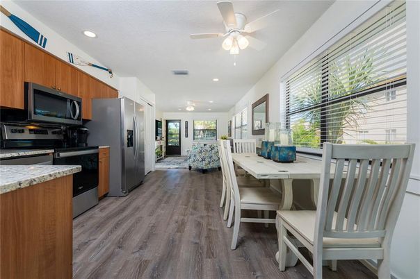 Dining room, Interior, Kitchen, Recessed Lighting, Stainless Steel Appliances, Wood Texture Flooring