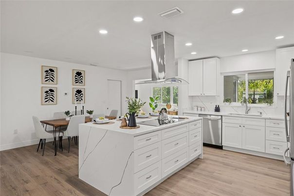Dining room, Interior, Kitchen, Recessed Lighting, Stainless Steel Appliances, Wood Texture Flooring