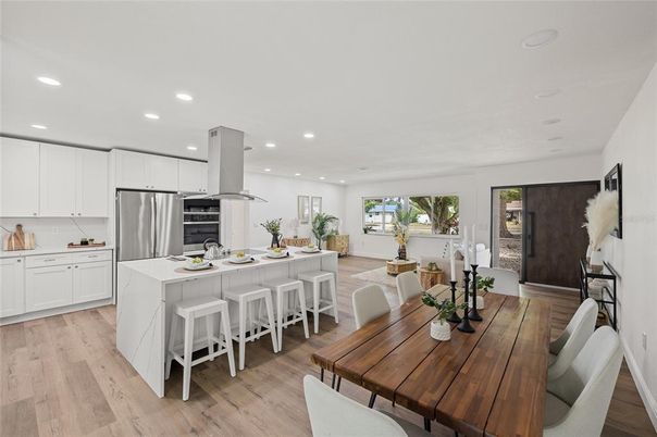 Dining room, Interior, Kitchen, Recessed Lighting, Stainless Steel Appliances, Wood Texture Flooring