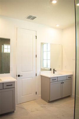 Bathroom, Dual Sink Vanities, Glass Shower, Interior, Marble, Recessed Lighting