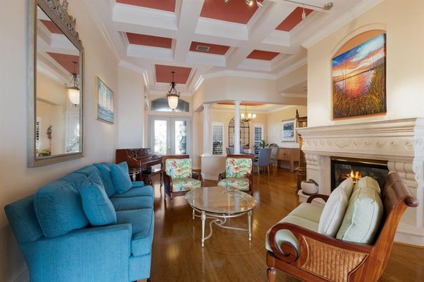 Chandelier, Dining room, Fireplace, Interior, Living room, Pendant Lights, Piano, Wood Texture Flooring