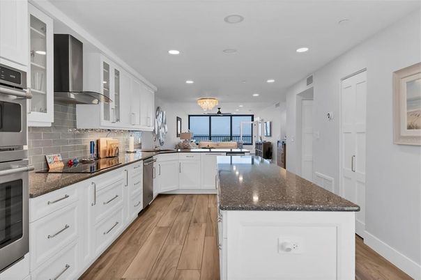 Chandelier, Interior, Kitchen, Recessed Lighting, Stainless Steel Appliances, Wood Texture Flooring