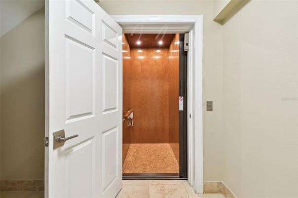 Elevator, Interior, Recessed Lighting, Wooden Ceilings, Wooden Walls