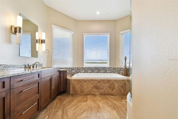 Bathroom, Dual Sink Vanities, Interior, Recessed Lighting, Wood Texture Flooring