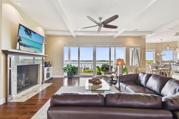 Dining room, Fireplace, Interior, Living room, Pendant Lights, Recessed Lighting, Wood Texture Flooring