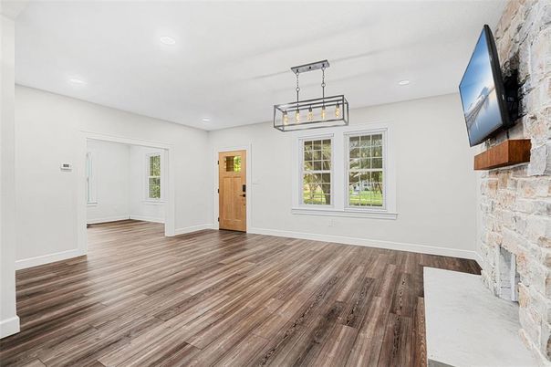 Empty room, Fireplace, Interior, Pendant Lights, Recessed Lighting, Wood Texture Flooring