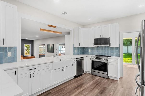 Interior, Kitchen, Recessed Lighting, Stainless Steel Appliances, Wood Texture Flooring