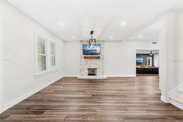 Empty room, Fireplace, Interior, Pendant Lights, Recessed Lighting, Wood Texture Flooring