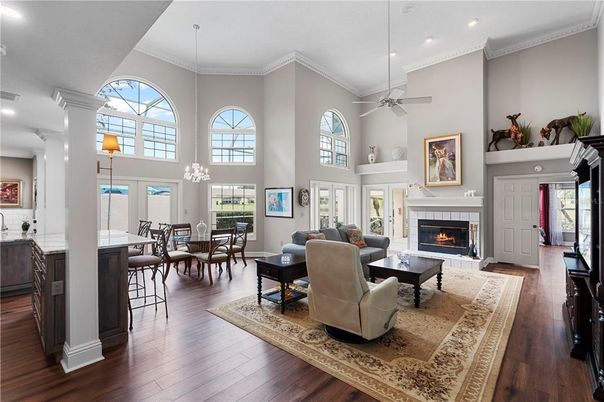Dining room, Fireplace, Interior, Living room, Pendant Lights, Recessed Lighting, Wood Texture Flooring