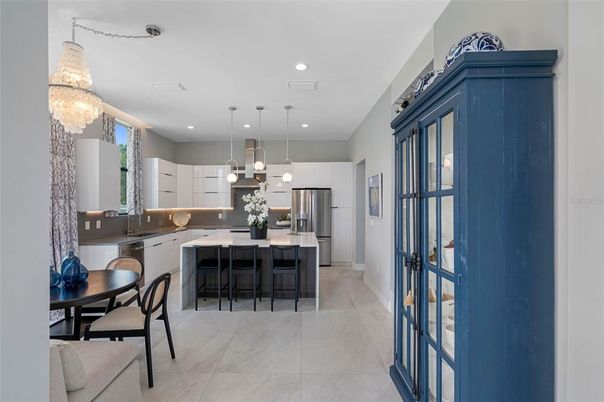 Chandelier, Dining room, Interior, Kitchen, Pendant Lights, Recessed Lighting, Stainless Steel Appliances